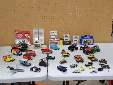 Assorted Toy Cars / Trucks lot including Monster Trucks, Advertising, Walt Disney, Pez, etc.