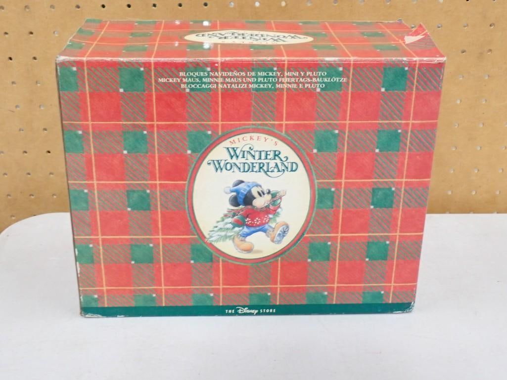 The Disney Store's Mickey's Winter Wonderland Christmas Figurine: The Disney Store's Mickey's Winter Wonderland Christmas Figurine - should look similar to the last picture All pictures are considered part of the description and should be examined carefully 
