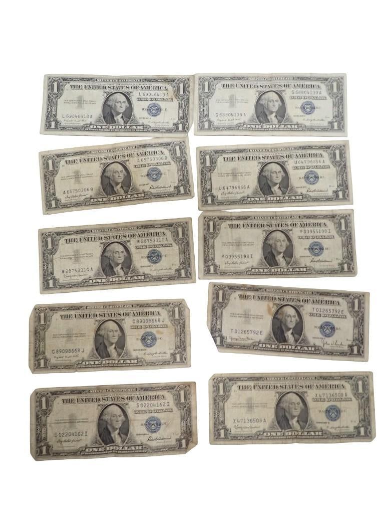 Lot of 10 Blue Seal Washington Dollar Bill Silver Certificates: Lot of 10 Blue Seal Washington Dollar Bill Silver Certificates All pictures are considered part of the description and should be examined carefully by bidders. Live Auctioneers is now offering Live Sh