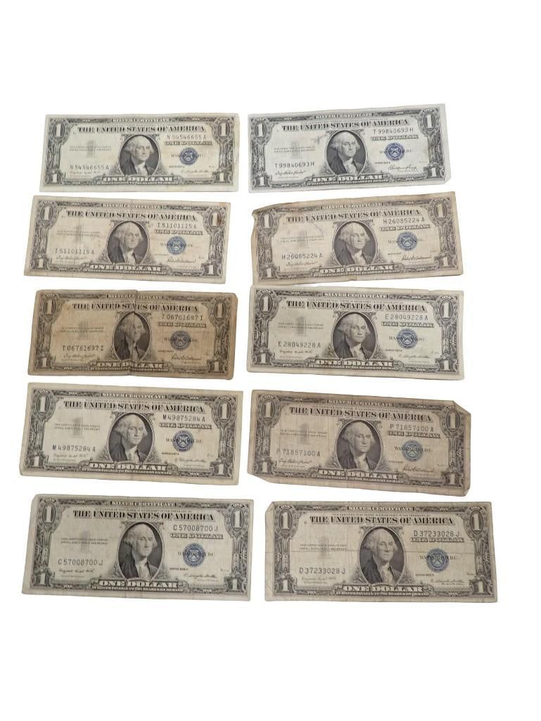 Lot of 10 Blue Seal Washington Dollar Bill Silver Certificates: Lot of 10 Blue Seal Washington Dollar Bill Silver Certificates All pictures are considered part of the description and should be examined carefully by bidders. Live Auctioneers is now offering Live Sh