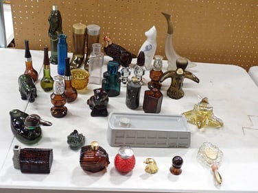 Large Lot of assorted Avon Perfume / Cologne Bottles including Boots, Animals, Figurines, etc.