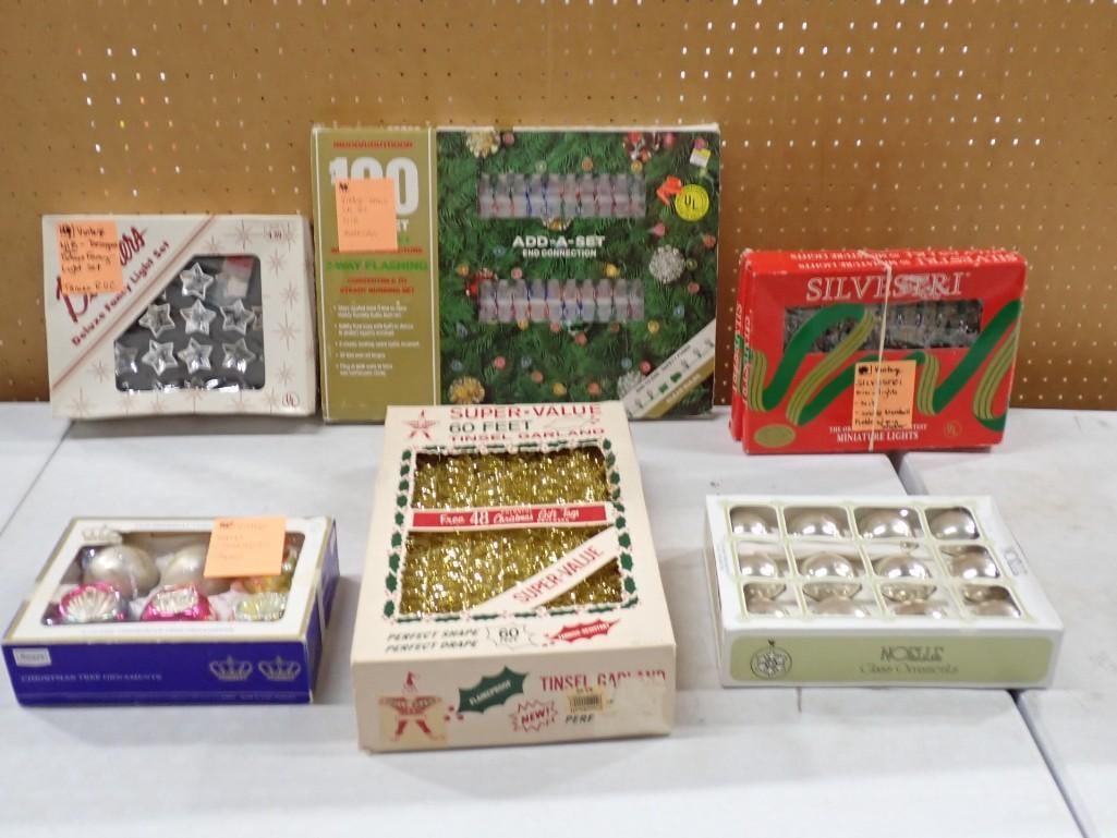 Lot of Vintage Christmas Ornaments and Lights including new in original boxes: Lot of Vintage Christmas Ornaments and Lights in including new in original boxes including Silvestri, Tinsel, etc All pictures are considered part of the description and should be examined carefully b