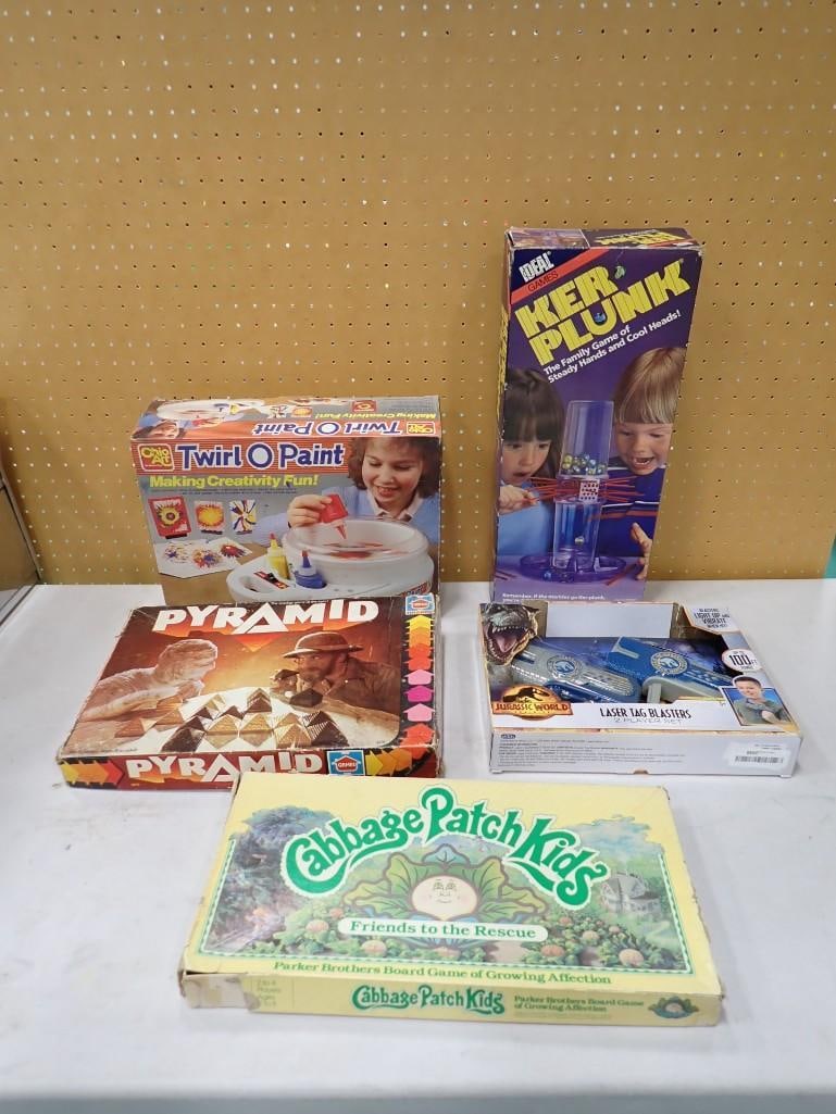 Toy / Game Lot including Ker Plunk, Ohio Art Twirl O Paint, Pyramid, Laser Tag Blasters, Cabbage (1 of 6)