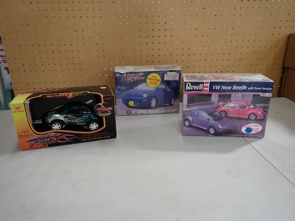 Pair of Revell Volkswagen Model Kits - New Beetle and a Gun 'em Racers Beetle Car: Pair of Revell Volkswagen Model Kits - New Beetle and a Gun 'em Racers Beetle Car 8x7x4" All pictures are considered part of the description and should be examined carefully by bidders. Live A