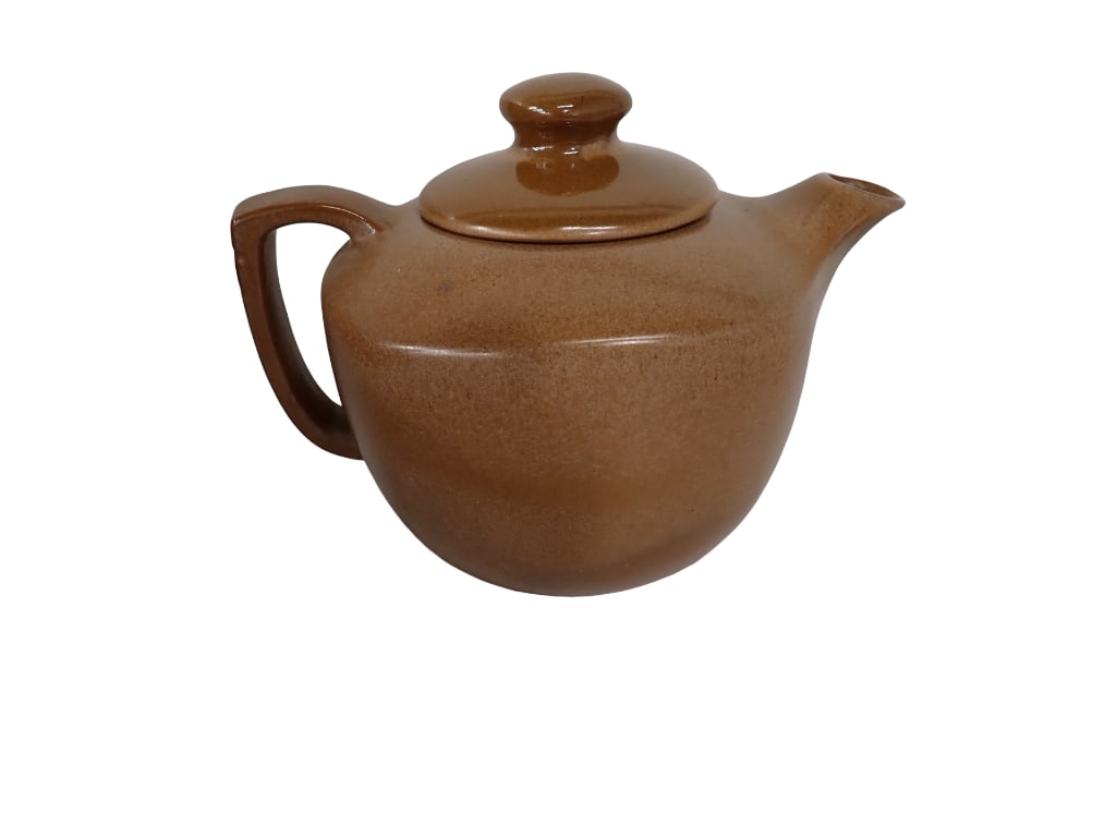 Vintage 1950s Frankoma Pottery Plainsman Brown Teapot: Vintage 1950s Frankoma Pottery Plainsman Brown Teapot All pictures are considered part of the description and should be examined carefully by bidders. Live Auctioneers is now offering Live Shipping