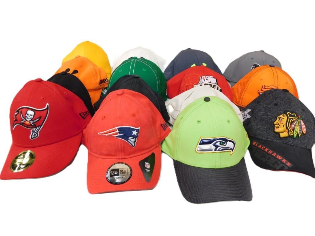 Assorted Baseball Style Hats - many still with tags or stickers including Patriots, Chicago Blackhaw: Assorted Baseball Style Hats - many still with tags or stickers including Patriots, Chicago Blackhawks, Las Vegas, Under Armour, etc. All pictures are considered part of the description and should be