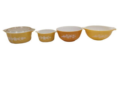 4 Vintage Pyrex Butterfly Gold Items incl 2 Casserole Dishes and 2 Mixing Bowls: Lot of&#160;4 Vintage Pyrex Butterfly Gold Items incl 2 Casserole Dishes and 2 Mixing Bowls .&#160; Larger casserole dish has a lid.&#160; Smaller one does not have a lid.  All pictures are considered