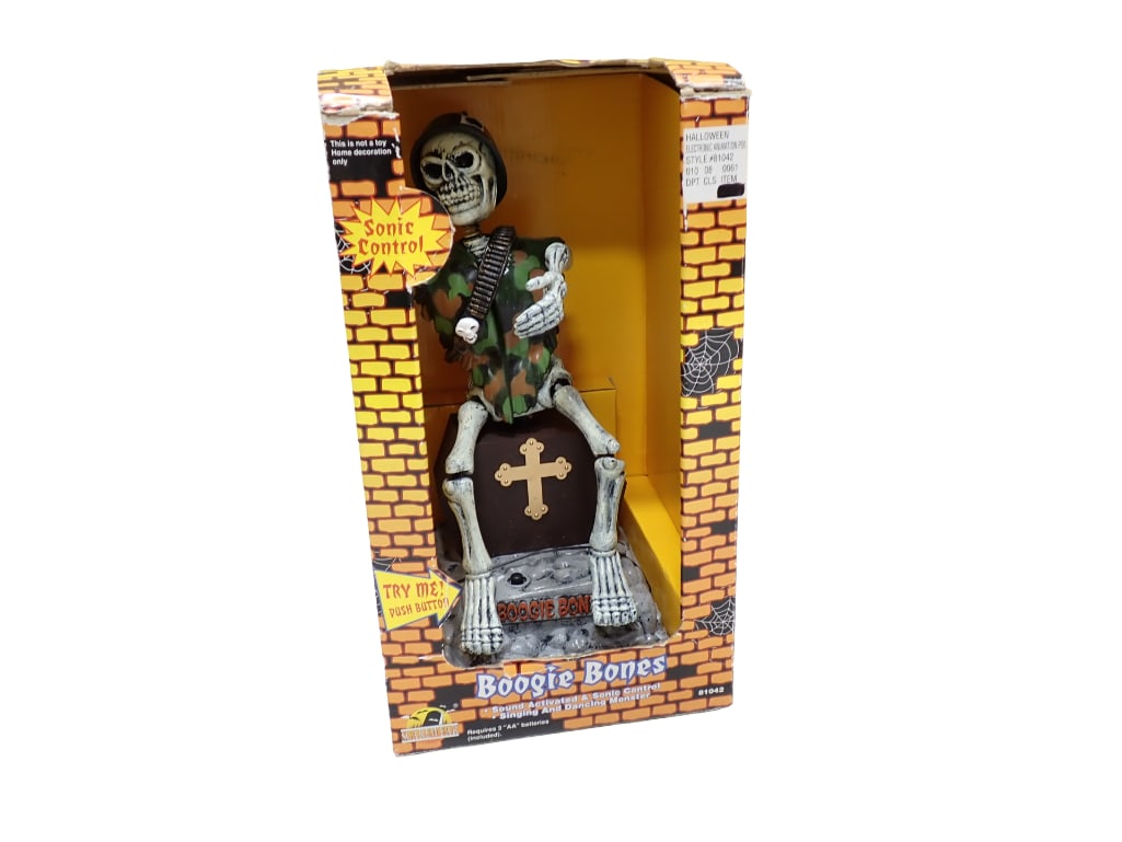 Boogie Bones Animated Skeleton Toy or Halloween Figure in Original Box: Boogie Bones Animated Skeleton Toy or Halloween Figure in Original Box. Box has some wear/damage - it works All pictures are considered part of the description and should be examined carefully by bidd