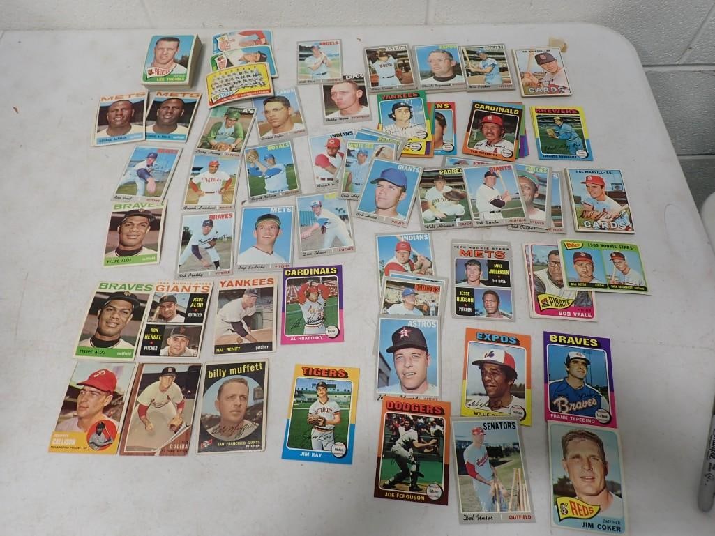 Lot of Topps Baseball Cards with years ranging from the 1950's through 1970's: Lot of Topps Baseball Cards with years ranging from the 1950's through 1970's All pictures are considered part of the description and should be examined carefully by bidders. Live Auctioneers 