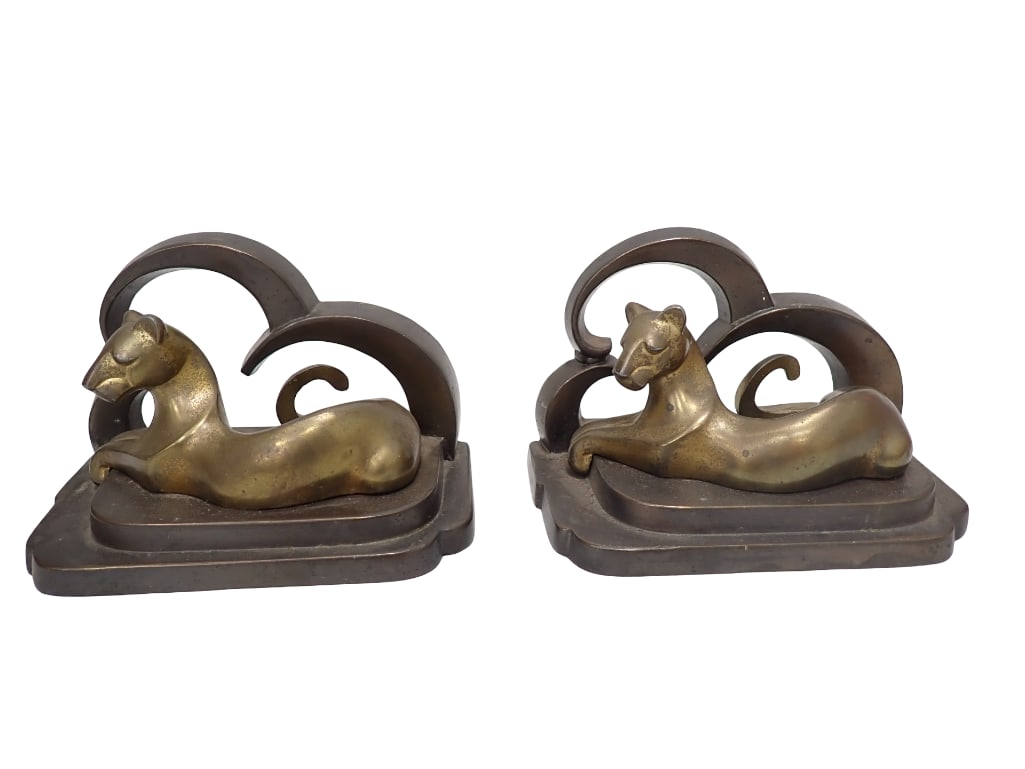 Pair of Art Deco Style Cast Metal Panther or Cougar Bookends: Pair of Art Deco Style Cast Metal Panther or Cougar Bookends All pictures are considered part of the description and should be examined carefully by bidders. Live Auctioneers is now offering Live Ship