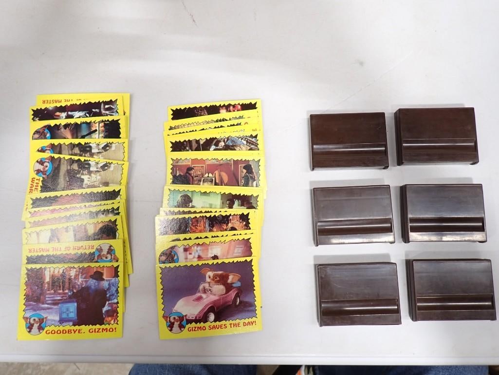 6 Mattel Game Cartridges and Gremlins Trading Cards: 6 Mattel Game Cartridges and Gremlins Trading Cards All pictures are considered part of the description and should be examined carefully by bidders. Live Auctioneers is now offering Live Shipping