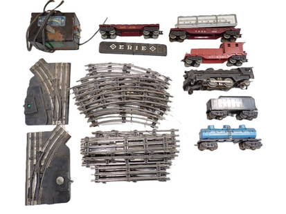 Lot of Louis Marx O Scale Trains, Tracks, Transformer, Erie, etc.: Lot of Louis Marx O Scale Trains, Tracks, Transformer, Erie, etc. All pictures are considered part of the description and should be examined carefully by bidders. Live Auctioneers is now offering Live