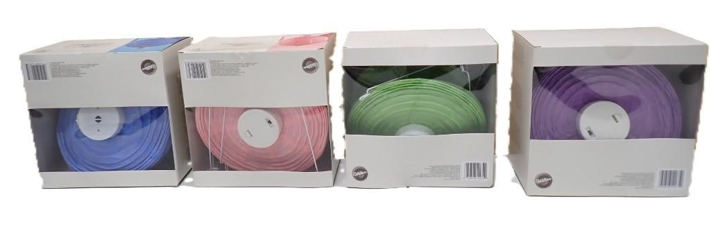 Set of 4 Sets of 3 Wilton Lighted Lanterns - 4 different colors: Set of 4 Sets of 3 Wilton Lighted Lanterns - 4 different colors All pictures are considered part of the description and should be examined carefully by bidders. Live Auctioneers is now offering Live S