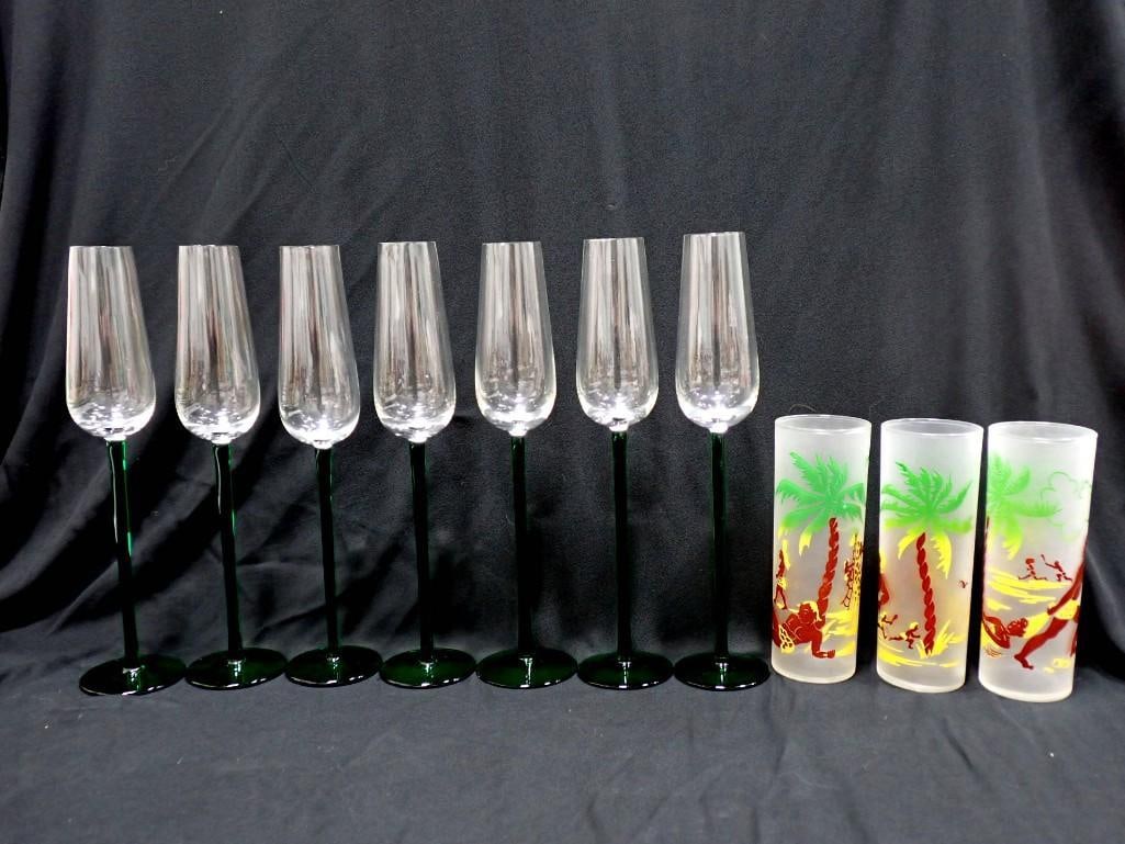 Barware Lot including Vintage Frosted Glass Tiki Glasses, Champaign Flutes with Long Green Stems: Bar ware Lot including Vintage Frosted Glass Tiki Glasses, Champaign Flutes with Long Green Stems All pictures are considered part of the description and should be examined carefully by bidders. Live 