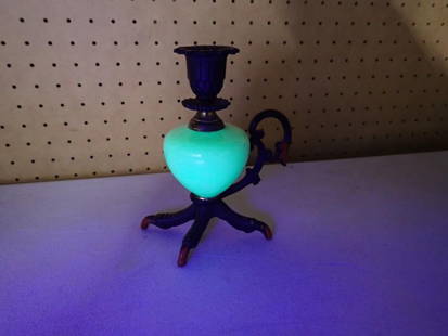 Vintage Uranium Glass Candle Holder with Bird Talon or Claw Base: Vintage Uranium Glass Candle Holder with Bird Talon or Claw BaseAll pictures are considered part of the description and should be examined carefully by bidders.Live Auctioneers is now offering Live Sh