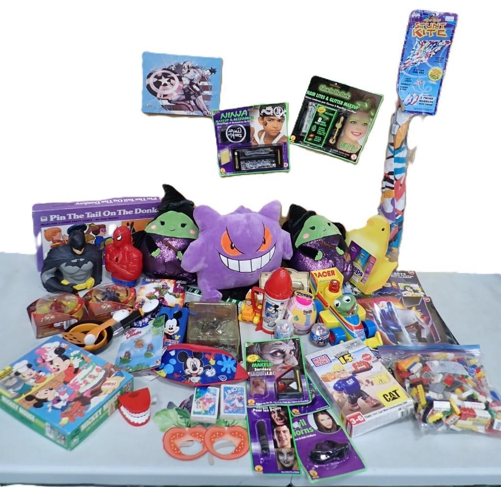 Large Lot of Toys / Halloween / Games including Walt Disney, Batman, Spiderman, Mega Bloks, Plush: Large Lot of Toys / Halloween / Games including Walt Disney, Batman, Spiderman, Mega Bloks / Lego, Plush, Halloween Makeup, Kite, Muppet Babies, etc. All pictures are considered part of the descriptio