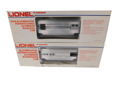 2 Lionel O Gauge Pennsylvania Aluminum Baggage Cars incl 1 Illuminated and 1 Non-Illuminated: 2 Lionel O Gauge Pennsylvania Aluminum Baggage Cars incl 1 Illuminated and 1 Non-Illuminated.&#160; Both new in original boxes.  All pictures are considered part of the description and should be exami