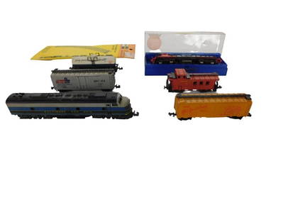 Model Train Lot including N Scale, Bachmann 4606, Track, Fleischmann, etc.: Model Train Lot including N Scale, Bachmann 4606, Track, Fleischmann, etc. All pictures are considered part of the description and should be examined carefully by bidders. Live Auctioneers is now offe