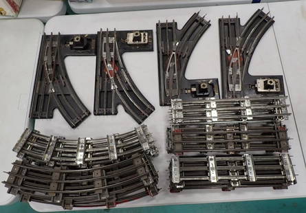 Lot of O Scale Track including Switches, Curves, etc.: Lot of O Scale Track including Switches, Curves, etc. All pictures are considered part of the description and should be examined carefully by bidders. Live Auctioneers is now offering Live Shipping th