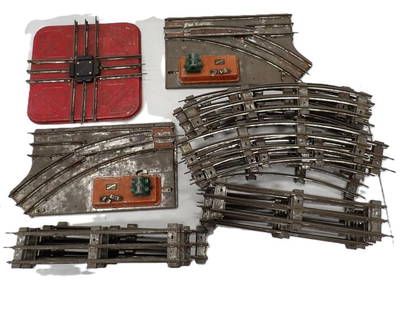 Lot of Vintage O Scale Model Train Track including Crosses, Curves, Switches, etc.: Lot of Vintage O Scale Model Train Track including Crosses, Curves, Switches, etc.  All pictures are considered part of the description and should be examined carefully by bidders. Live Auctioneers is