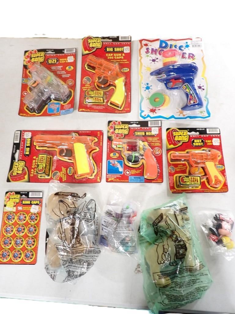 Toy Gun Lot including Roll Cap Guns, Ring Caps, Disc Shooter, etc: Toy Gun Lot including Roll Cap Guns, Ring Caps, Disc Shooter, etc All pictures are considered part of the description and should be examined carefully by bidders. Live Auctioneers is now offering Live