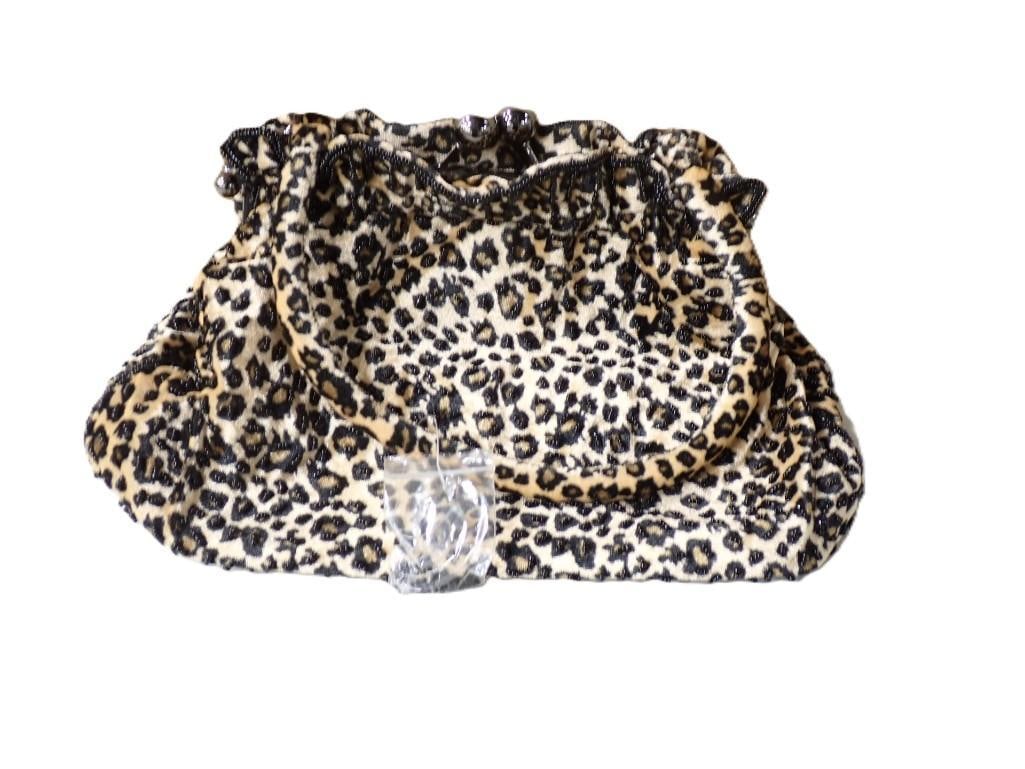 Cheetah Print Beaded Purse: Cheetah Print Beaded Purse All pictures are considered part of the description and should be examined carefully by bidders. Live Auctioneers is now offering Live Shipping through them. This is a