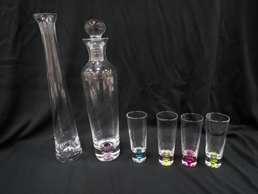 Shot glasses with color bottoms, Glass Pitcher Marked Triple Sec with glass stopper, and a Vase or