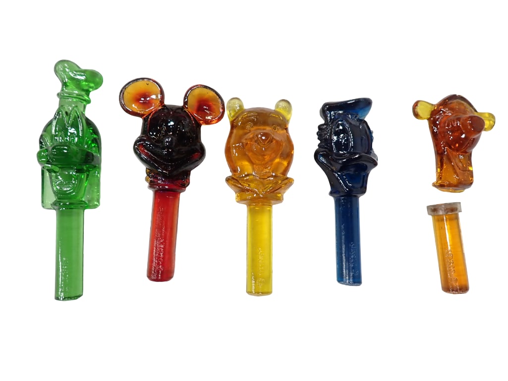 Vintage Disney Glass Stoppers Bottle Toppers Asst Colors and Characters: 4 Vintage Disney Glass Stoppers Bottle Toppers Asst Colors and Characters Includes blue glass Donald duck, amberina Mickey Mouse, Amber Winnie the Pooh, etc. Condition: amber co