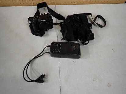 Camera Lot including Canon EOS, Charger, Bag: Camera Lot including Canon EOS, Charger, Bag May have been used in Movies and/or TV Shows as Props NO COA or Paperwork The consignor worked on multiple movies and TV shows and this movie or TV prop lo