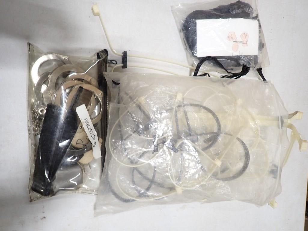 Lot of Handcuffs and Zip Ties / Hand Ties - possibly used in TV Shows and/or movies (1 of 7)