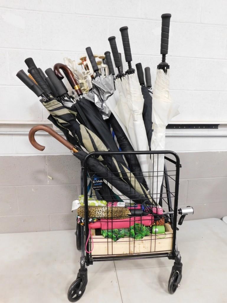Cart full of assorted Umbrellas which were likely used as props in TV Shows and/or Movies: Cart full of assorted Umbrellas which were likely used as props in TV Shows and/or Movies May have been used in Movies and/or TV Shows as Props NO COA or Paperwork The consignor worked on multiple mov