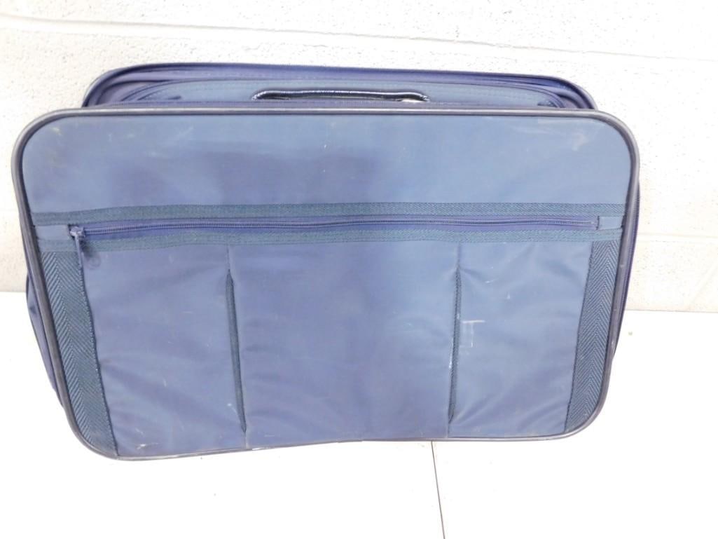 American Tourist Suitcase or Bag: American Tourist Suitcase or Bag 14x21" May have been used in Movies and/or TV Shows as Props NO COA or Paperwork The consignor worked on multiple movies and TV shows and this movie or TV prop lot