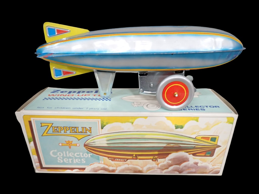 Vintage Collector Series Zeppelin Tin Toy NOS New Old Stock: Vintage Collector Series Zeppelin Tin Toy NOS New Old Stock All pictures are considered part of the description and should be examined carefully by bidders. Live Auctioneers is now offering Live Shipp