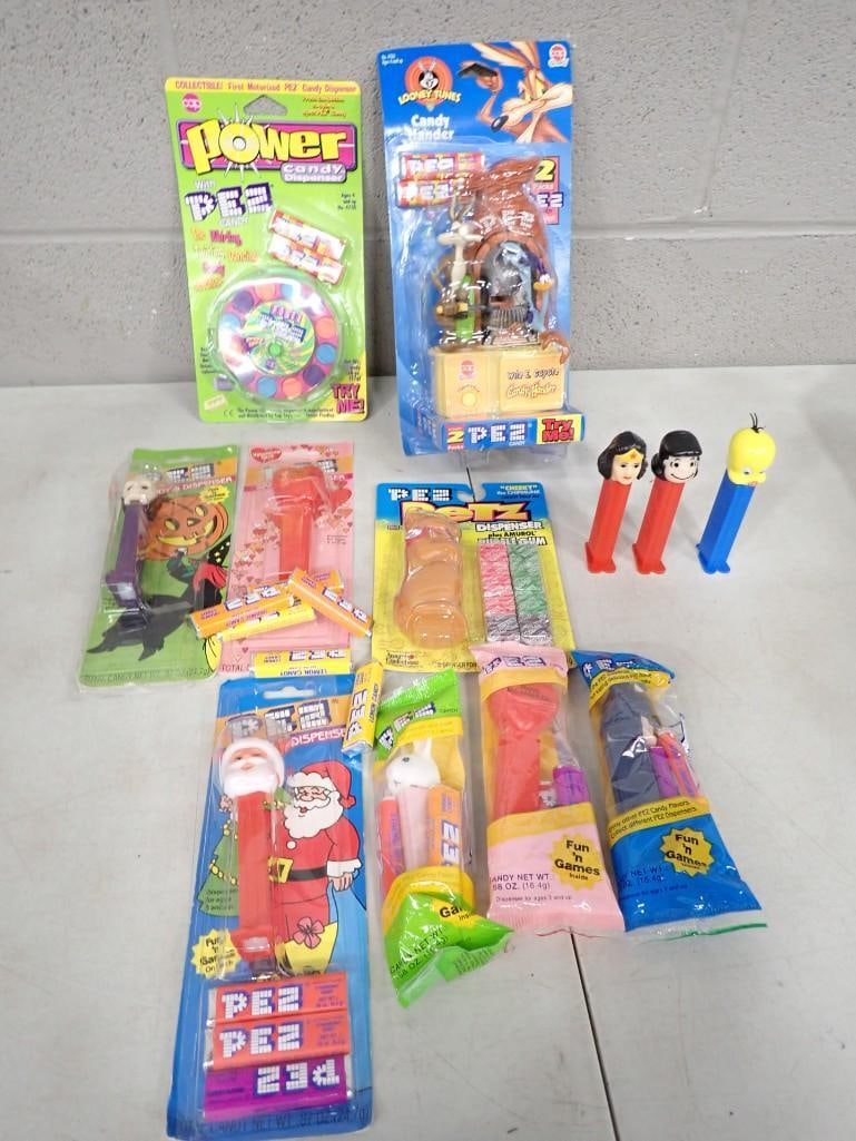 Lot of Pez Dispensers incl Looney Tunes, Tweety Bird, Wonder Woman, Lucy, etc: Lot of Pez Dispensers incl Looney Tunes, Tweety Bird, Wonder Woman, Lucy, etc. Includes some sealed and some loose All pictures are considered part of the description and should be examined car