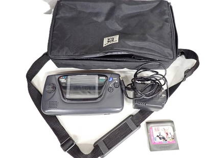 Sega Game Gear System with Surf Ninja Game, Case, Power Adapter.  Untested: Sega Game Gear System with Surf Ninja Game, Case, Power Adapter. Untested All pictures are considered part of the description and should be examined carefully by bidders. Live Auctioneers is now offer