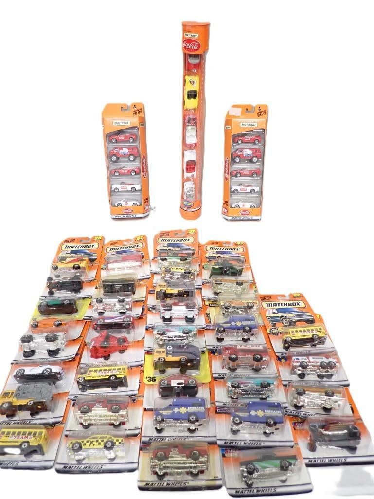 Lot of New in Package Matchbox Cars, Trucks, etc, Mattel Wheels, Coca Cola, etc.: Lot of New in Package Matchbox Cars, Trucks, etc, Mattel Wheels, Coca Cola, etc. All pictures are considered part of the description and should be examined carefully by bidders. Live Auctioneers is no