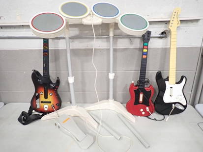 Lot of Video Game Guitar and Drum Set Controllers - Comes with everything as shown - untested: Lot of Video Game Guitar and Drum Set Controllers - Comes with everything as shown - untested All pictures are considered part of the description and should be examined carefully by bidders. Live Auct