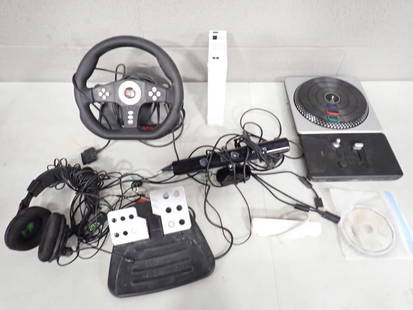 Video Game Lot including Nintendo Wii System, DJ Hero Turntable, Car Pedal Accessory, other Accessor: Video Game Lot including Nintendo Wii System, DJ Hero Turntable, Car Pedal Accessory, other Accessories, etc.&#160; All untested All pictures are considered part of the description and should be exami