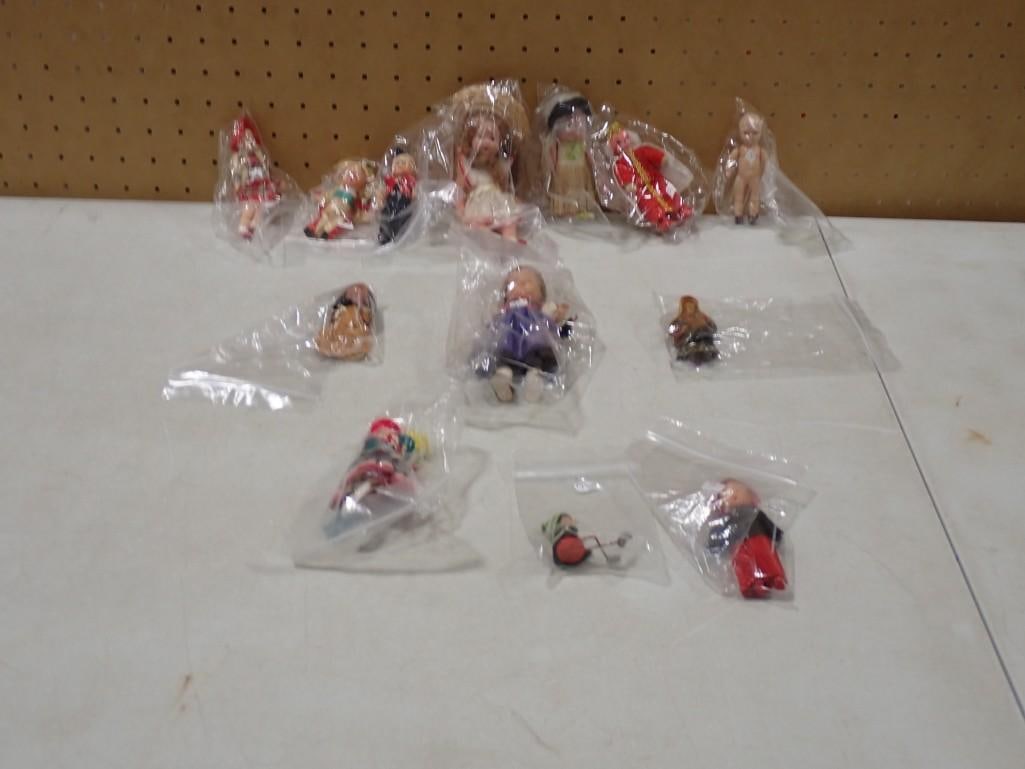 Vintage/Antique Mini Hard Plastic, Celluoid Dolls including Kewpie Type, Sleep Eyes, Souvenir, etc.: Vintage/Antique Mini Hard Plastic, Celluoid Dolls including Kewpie Type, Sleep Eyes, Souvenir, etc. All pictures are considered part of the description and should be examined carefully by bidders. Liv