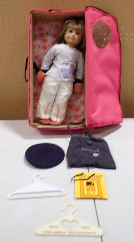 American Girl Doll with Case and some Accessories: American Girl Doll with Case and some Accessories All pictures are considered part of the description and should be examined carefully by bidders. Live Auctioneers is now offering Live Shipping throug