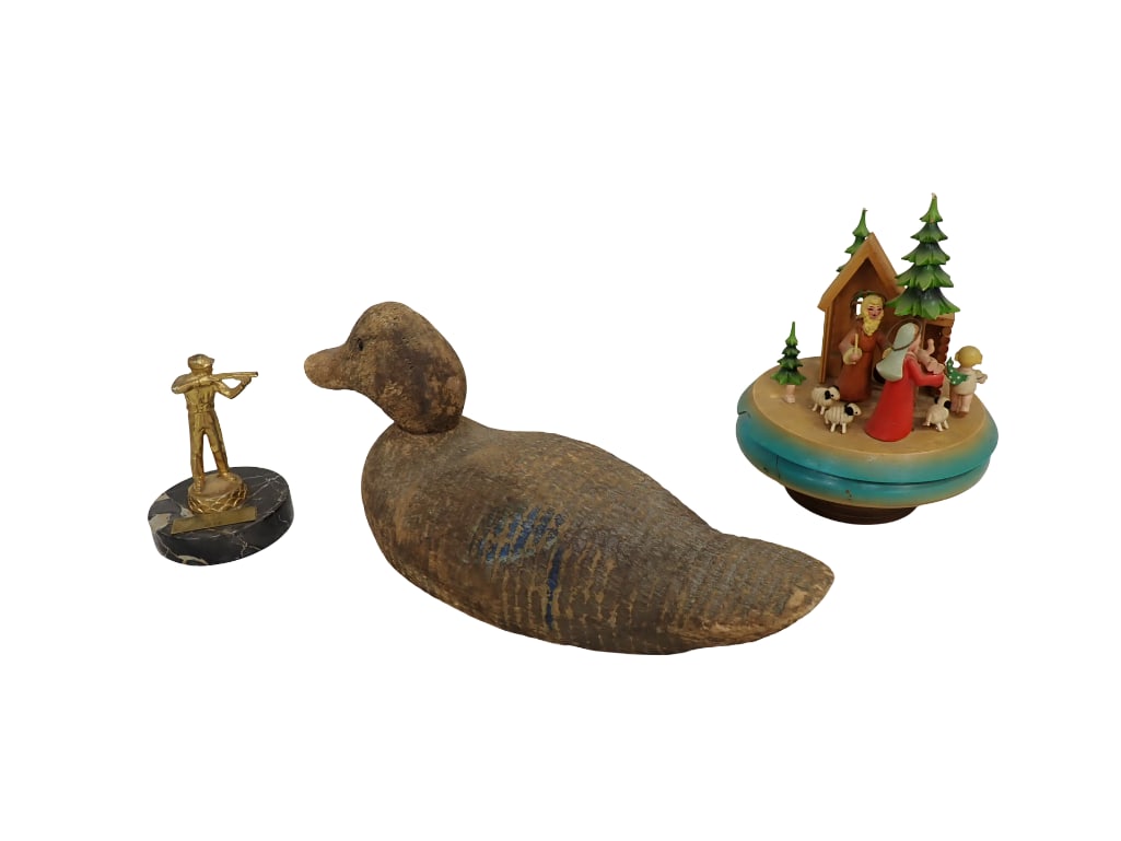 Thorens Music Box, Antique Duck Decoy, and 1958 Shooter Trophy: Thorens Music Box, Antique Duck Decoy, and 1958 Shooter Trophy. Decoy is 15". Condition: Music box is missing parts All pictures are considered part of the description and