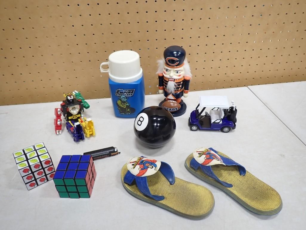 Vintage Emperor Strikes Back Thermos, Vintage 1970 Superman Sandals, Rubiks Cubes,: Vintage Emperor Strikes Back Thermos, Vintage 1970 Superman Sandals, Rubiks Cubes, Transformer, Magic 8 Ball, and more All pictures are considered part of the description and should be examined caref