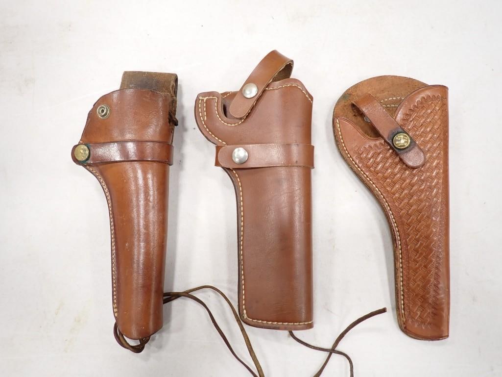 3 Vintage Leather Pistol Holsters incl Brauer Bros, J16, Hunter 15 19 36: 3 Vintage Leather Pistol Holsters incl Brauer Bros, J16, Hunter 15 19 36 All pictures are considered part of the description and should be examined carefully by bidders. Live Auctioneers is now offeri