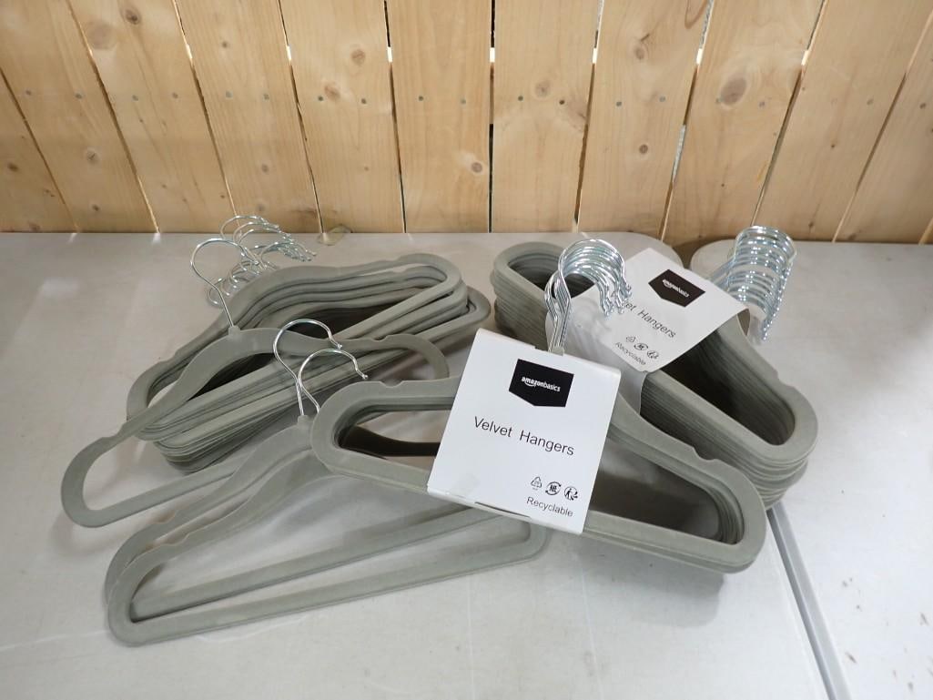 Lot of 50+ Clothing Hangers incl Velvet and Wood: Lot of 50+ Clothing Hangers incl Velvet and Wood All pictures are considered part of the description and should be examined carefully by bidders. Live Auctioneers is now offering Live Shipping thr