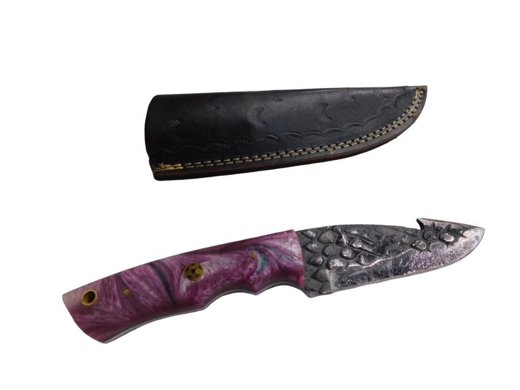 Knife with Purple Wood Handle, Hook on back of blade - comes with a Sheath: Knife with Purple Wood Handle, Hook on back of blade - comes with a Sheath All pictures are considered part of the description and should be examined carefully by bidders. Live Auctioneers is now offe