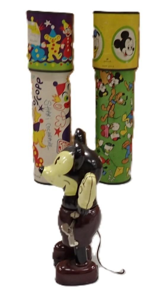 Hallmark Disney Wind Up Mickey Mouse and 2 Vintage Kaleidoscopes: Hallmark Disney Wind Up Mickey Mouse and 2 Vintage Kaleidoscopes All pictures are considered part of the description and should be examined carefully by bidders. Live Auctioneers is now offering Live