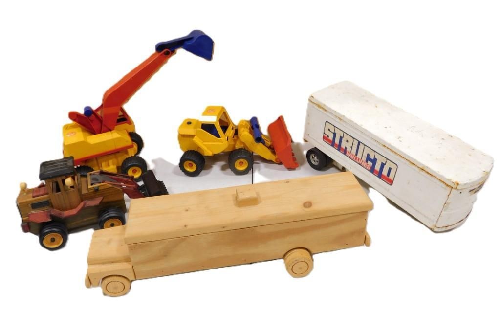 Toy Truck Lot including Wooden, Construction, Structo Pressed Steel, etc.: Toy Truck Lot including Wooden, Construction, Structo Pressed Steel, etc. All pictures are considered part of the description and should be examined carefully by bidders. Live Auctioneers is now offer