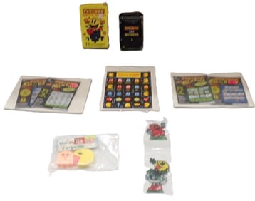 Pac Man Lot including Bandages, Lottery Tickets, Stickers, Eraser Perfume, etc.