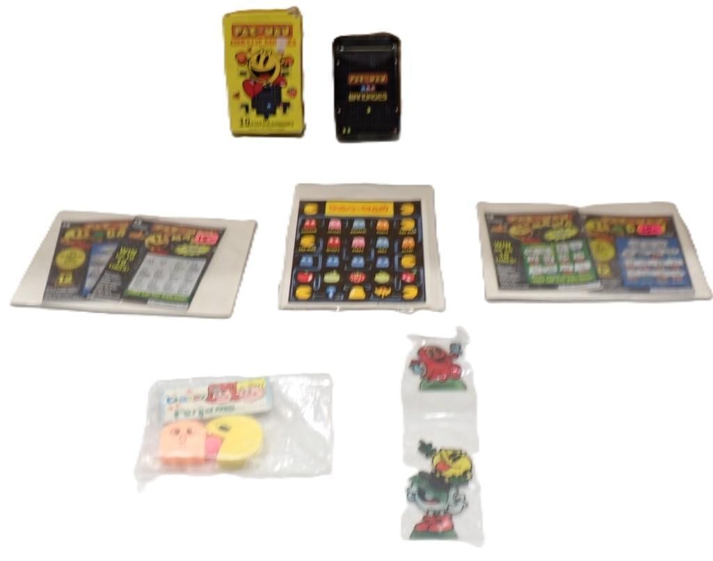 Pac Man Lot including Bandages, Lottery Tickets, Stickers, Eraser Perfume, etc.: Pac Man Lot including Bandages, Lottery Tickets, Stickers, Eraser Perfume, etc. All pictures are considered part of the description and should be examined carefully by bidders. Live Auctioneers is now