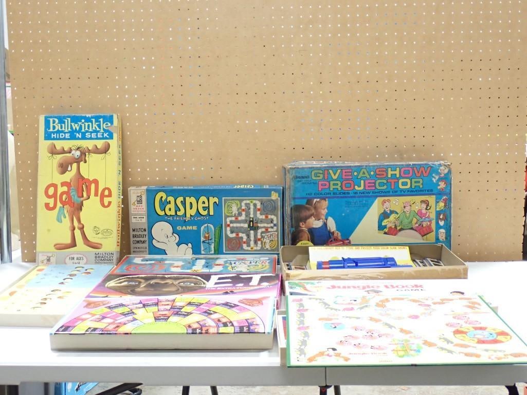 Assorted Game Lot including Bullwinkle Hide 'n Seek, Casper, E.T., Jungle Book, Give-a-Show Projecto (1 of 12)